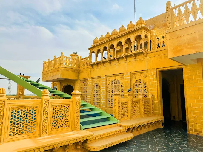 Golden sandstone architecture on the Guulab Haveli rooftop