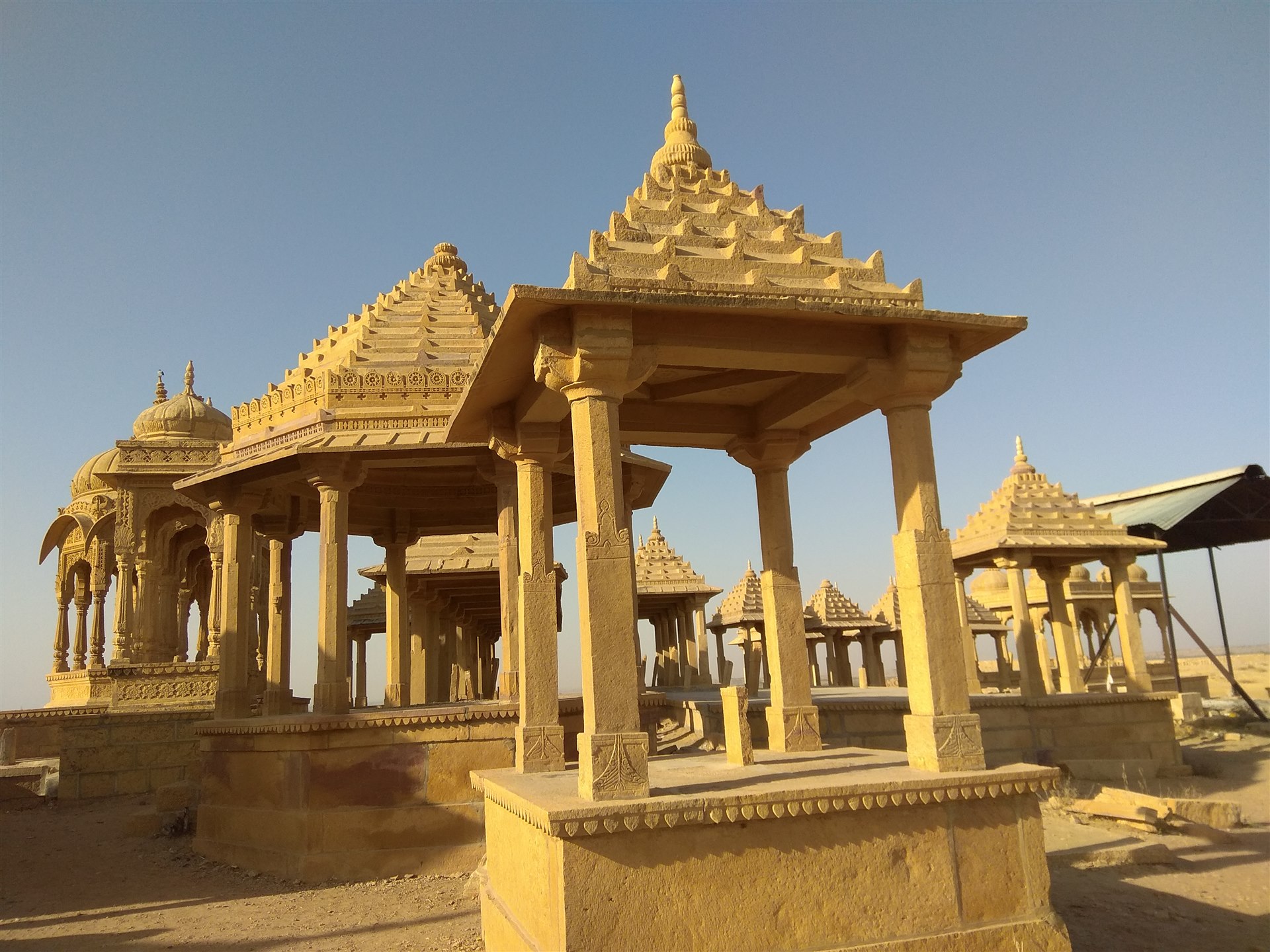 Golden sandstone cenotaphs at Vyas Chhatri in Jaisalmer